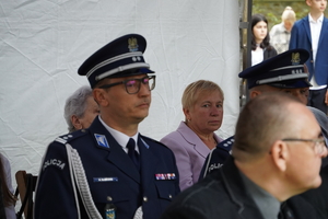 siedzący wśród gości komendant Policji